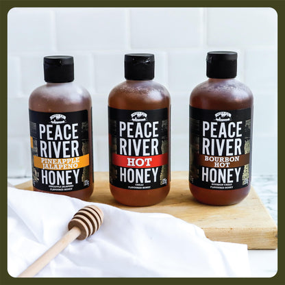 Peace River Hot Honey Pineapple & Jalapeno  | Medium Heat | Kosher Certified | Spicy Honey | Sustainably Sourced in Canada | Perfect for Drizzling, Glazing & Cooking | Squeeze Bottle 375g